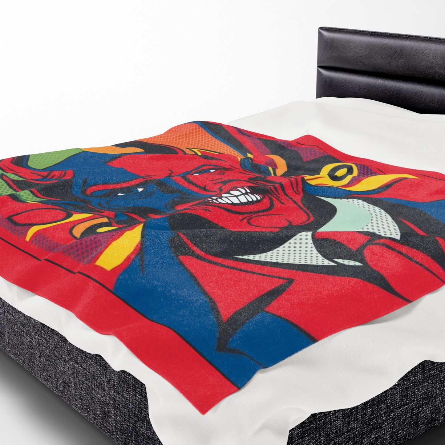 Wrap yourself in the bold colors and devilish charm of the Infernal Grin: Devil's Advocate Velveteen Blanket.