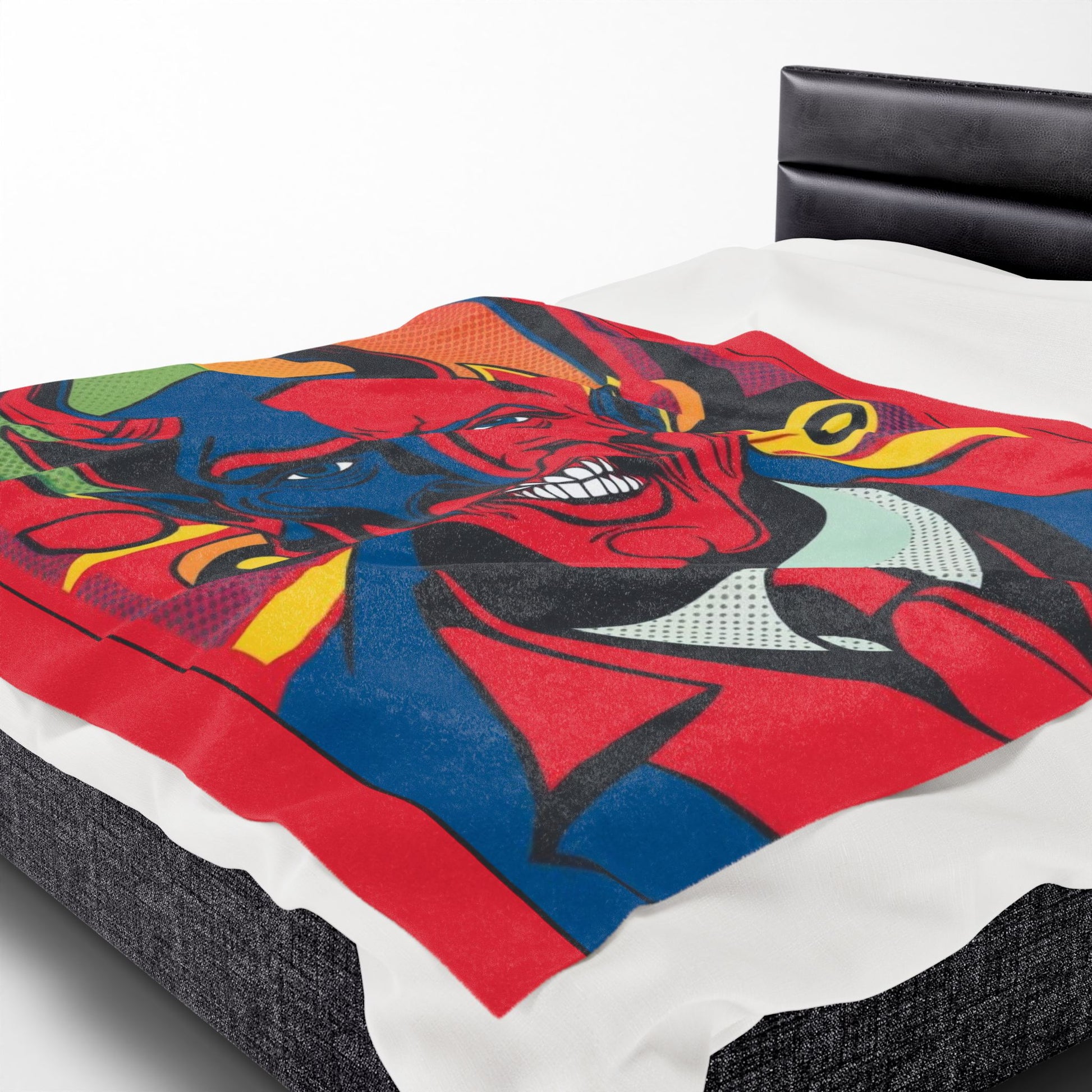 Wrap yourself in the bold colors and devilish charm of the Infernal Grin: Devil's Advocate Velveteen Blanket.