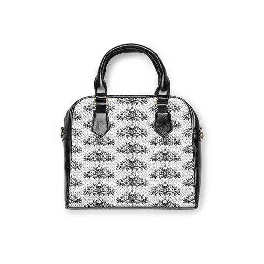 Onyx Wing: Shadowed Pattern Shoulder Bag features gothic skull design on white PU leather, perfect for bold fashion statements.