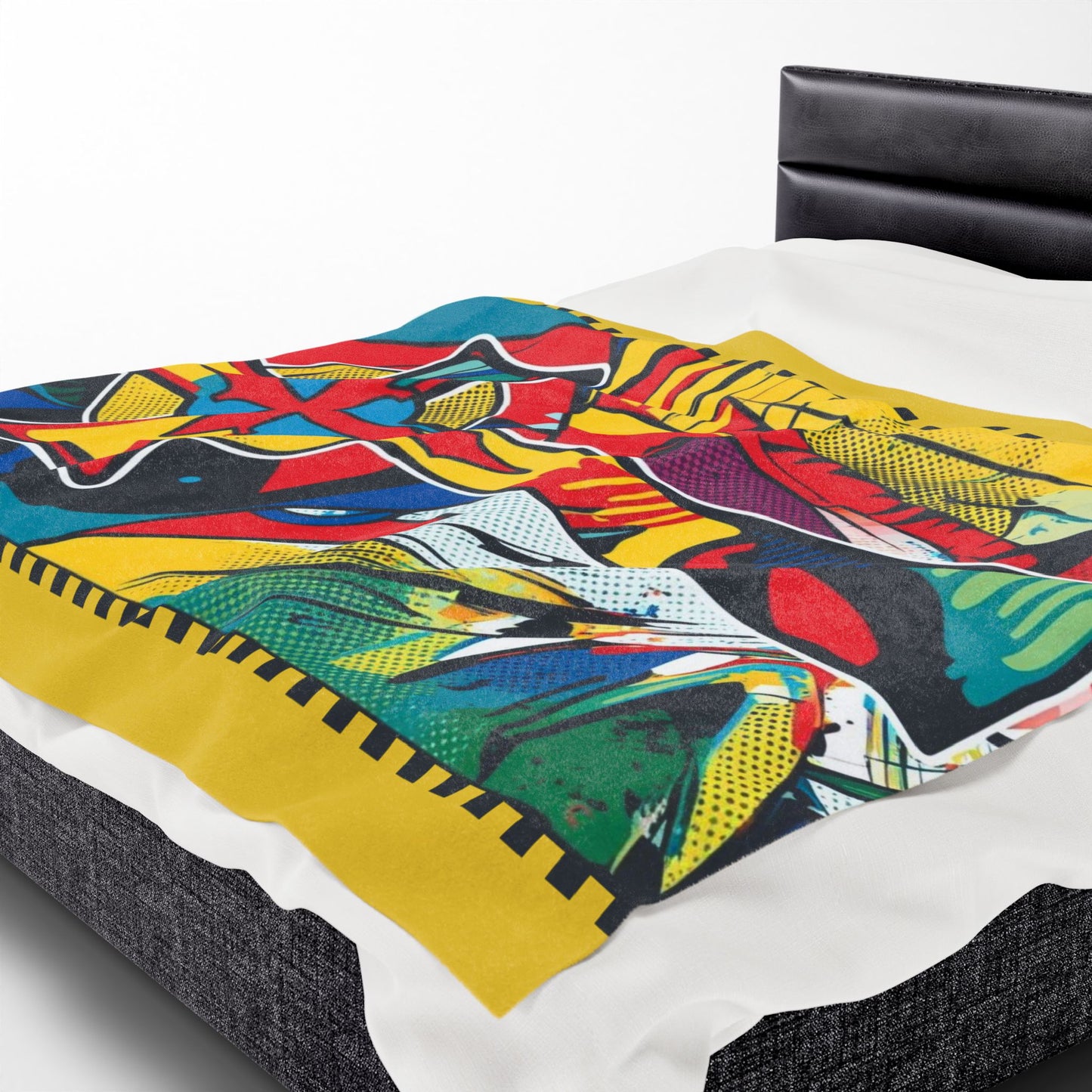 Vibrant Iconoclast's Cross: Abstract Symbol Velveteen Blanket draped over a bed, showcasing bold colors and design.