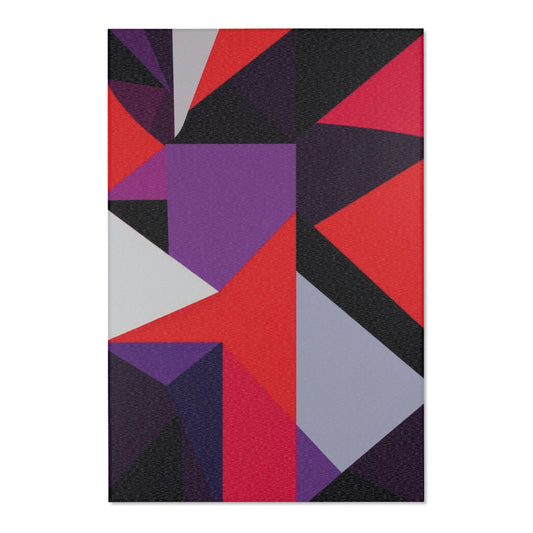 Transform your space with the Shattered Prism Geometric Hues Area Rug, showcasing bold reds and purples in striking designs.