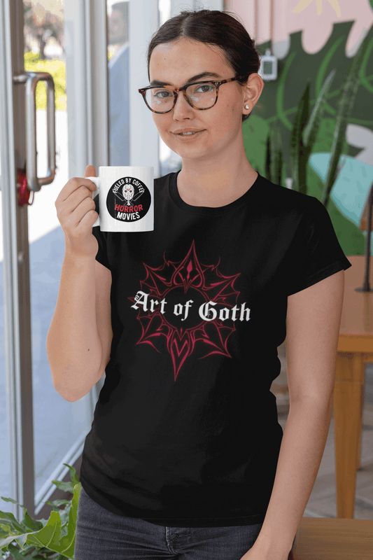 Gothic coffee mug saying "Fueled By Coffee & Horror Movies," perfect for caffeine-loving horror fans.