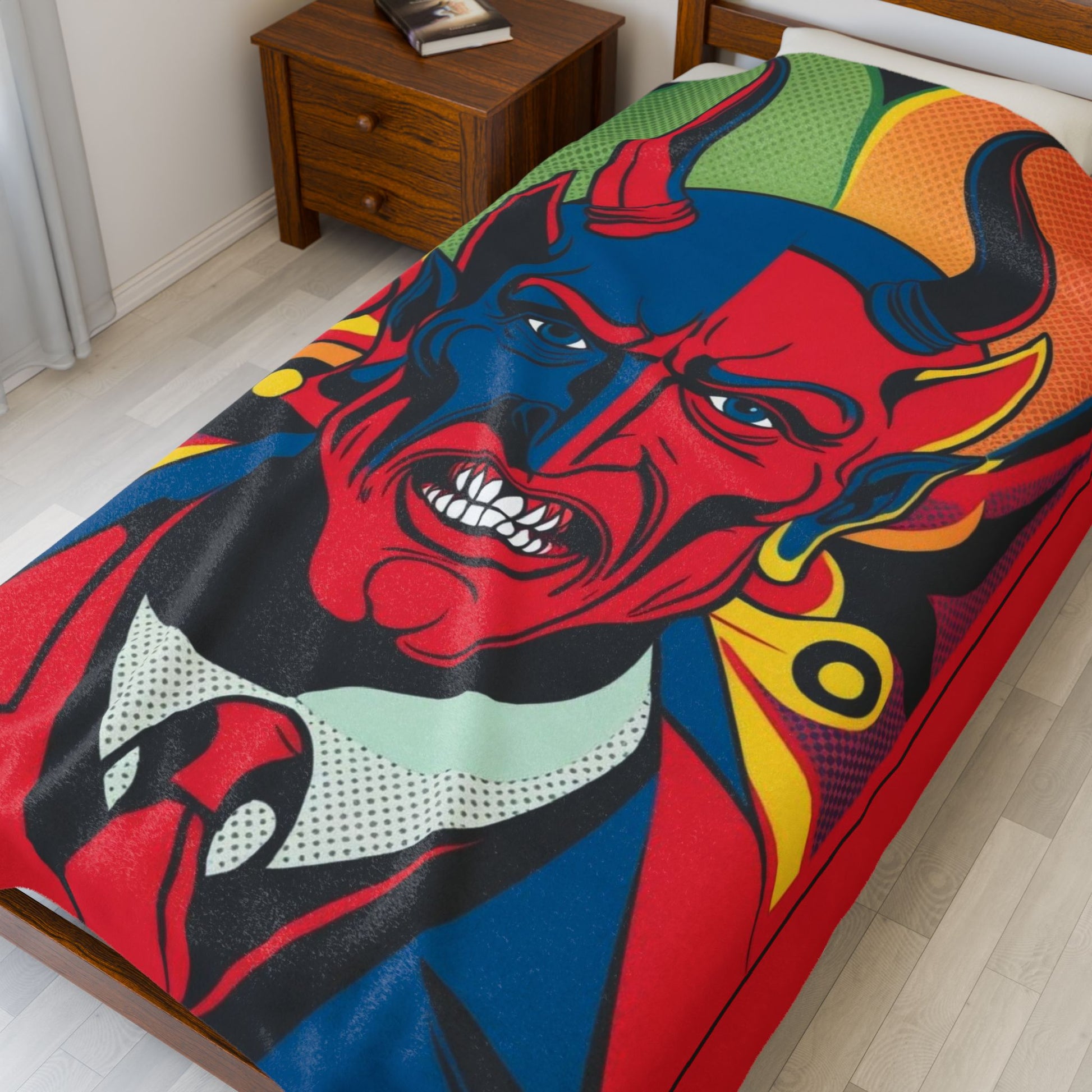 Wrap yourself in the vibrant Infernal Grin: Devil's Advocate Velveteen Blanket showcasing a striking devilish design.